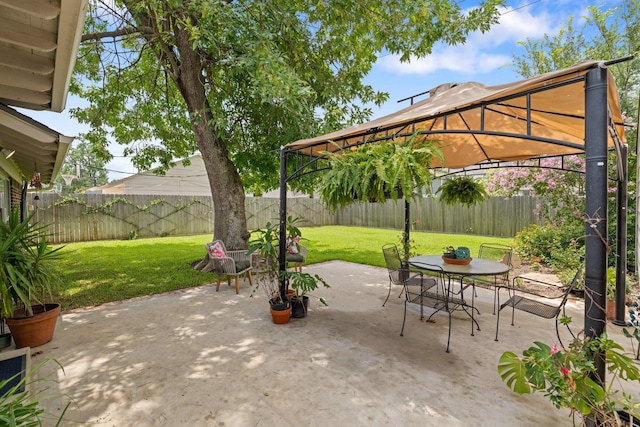 3006 Ann Arbor Dr, Houston, TX 77063 - fenced backyard with a gazebo, a patio, and outdoor dining area