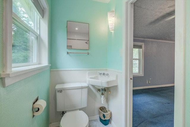 211 Magnolia St, Lake Jackson, TX 77566 - bathroom with toilet and a textured ceiling
