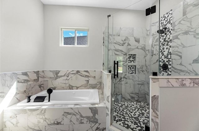 427 Rd 66111, Dayton, TX 77535 - full bathroom featuring a garden tub and a marble finish shower