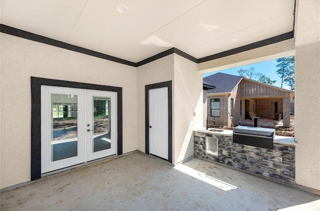 427 Rd 66111, Dayton, TX 77535 - view of patio featuring an outdoor kitchen and french doors