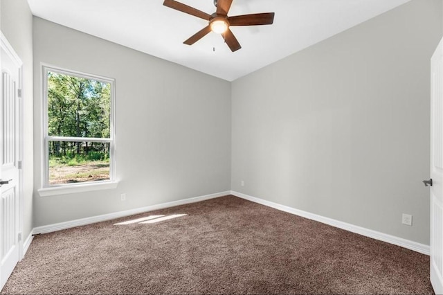 427 Rd 66111, Dayton, TX 77535 - empty room with carpet floors and a ceiling fan
