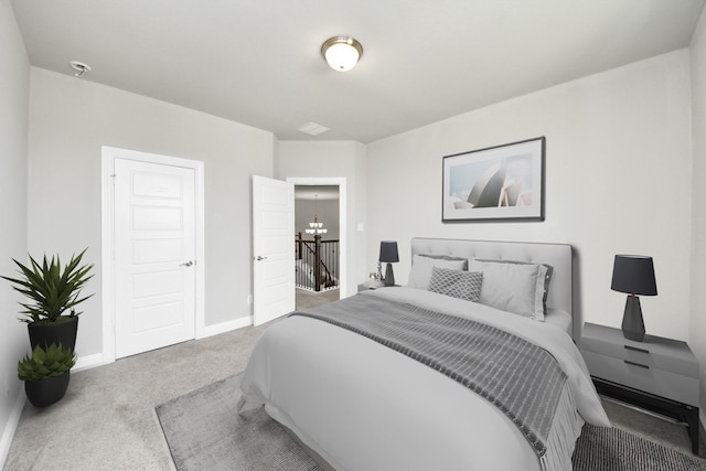 1831 Golden Cape Dr, Katy, TX 77494 - bedroom with carpet floors and a chandelier