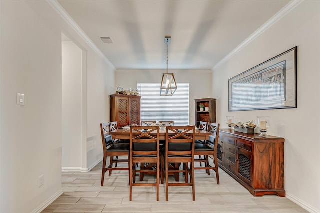 28638 Monarch Cliffs Dr, Fulshear, TX 77441 - dining room featuring ornamental molding and light wood finished floors