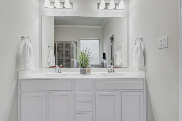 28638 Monarch Cliffs Dr, Fulshear, TX 77441 - full bathroom with a stall shower, double vanity, and crown molding