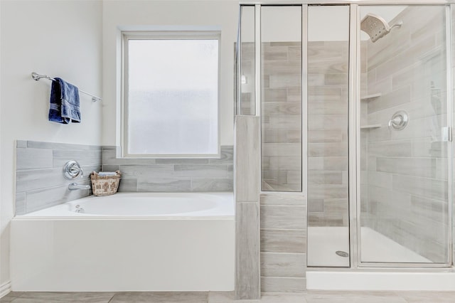 28638 Monarch Cliffs Dr, Fulshear, TX 77441 - full bath with a stall shower and a bath