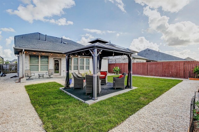 28638 Monarch Cliffs Dr, Fulshear, TX 77441 - fenced backyard featuring a gazebo and a patio area