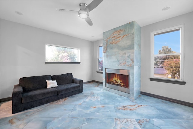 5215 Kelso St, Houston, TX 77021 - living area featuring a ceiling fan and a tiled fireplace