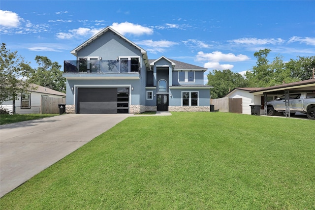 5215 Kelso St, Houston, TX 77021 - view of front facade featuring a balcony, a garage, driveway, stucco siding, and stone siding