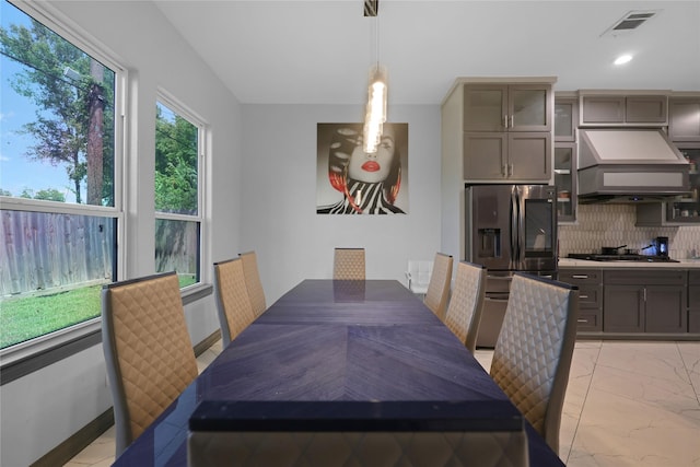 5215 Kelso St, Houston, TX 77021 - dining room featuring light marble finish flooring and recessed lighting