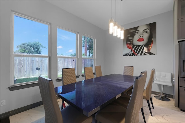5215 Kelso St, Houston, TX 77021 - dining area with light marble finish floors and a chandelier