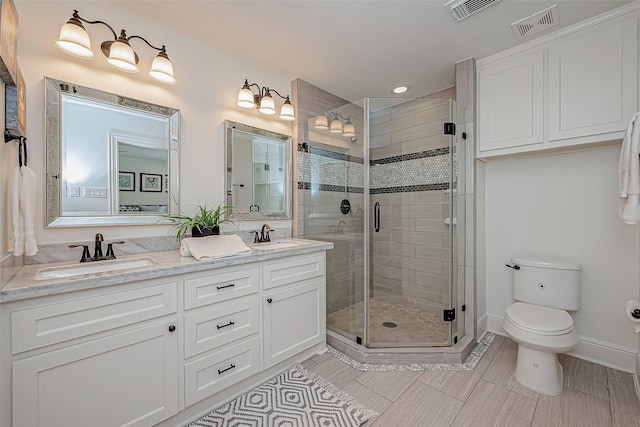 1714 Maux Dr, Houston, TX 77043 - bathroom featuring double vanity, a stall shower, and recessed lighting
