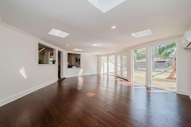 1714 Maux Dr, Houston, TX 77043 - unfurnished living room featuring a skylight, dark wood-type flooring, recessed lighting, and a wall mounted AC