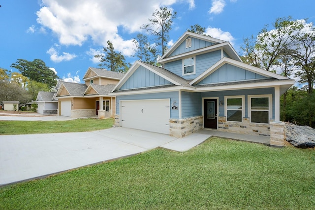 803 Cherokee Dr, Conroe, TX 77316 - view of front of house with board and batten siding, an attached garage, concrete driveway, stone siding, and a front lawn