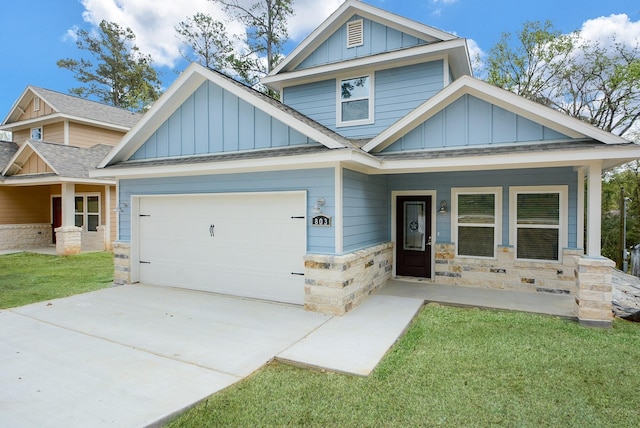 803 Cherokee Dr, Conroe, TX 77316 - craftsman house featuring board and batten siding, a garage, roof with shingles, stone siding, and concrete driveway