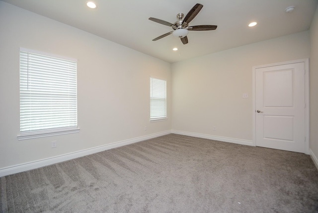 803 Cherokee Dr, Conroe, TX 77316 - empty room featuring a ceiling fan, carpet floors, recessed lighting, and a smoke detector