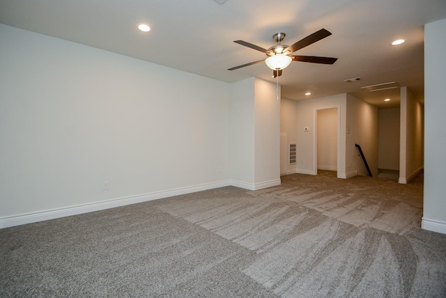 803 Cherokee Dr, Conroe, TX 77316 - empty room featuring carpet floors, a ceiling fan, and recessed lighting