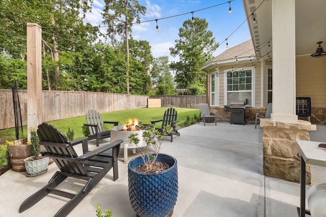 103 Jacks Corner Dr, Montgomery, TX 77316 - fenced backyard featuring an outdoor fire pit, a patio area, and grilling area