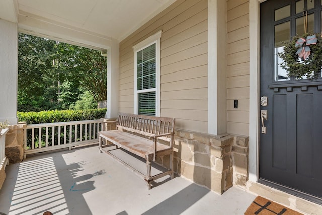 103 Jacks Corner Dr, Montgomery, TX 77316 - doorway to property featuring a porch and stone siding