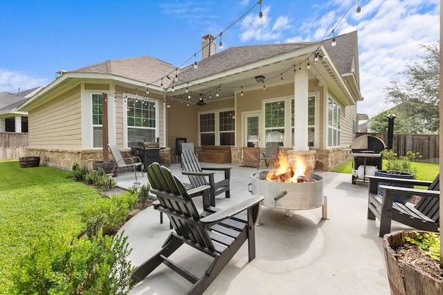 103 Jacks Corner Dr, Montgomery, TX 77316 - fenced backyard featuring an outdoor fire pit, a patio area, and area for grilling