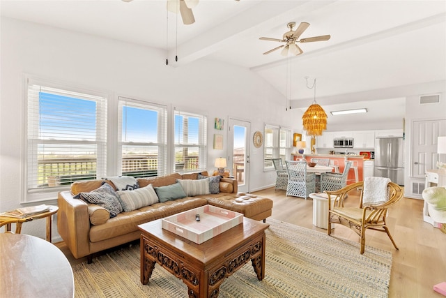4630 Blue Water Hwy, Freeport, TX 77541 - living area with ceiling fan and light wood-style floors