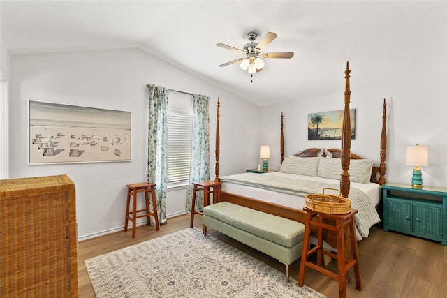 4630 Blue Water Hwy, Freeport, TX 77541 - bedroom featuring lofted ceiling, wood finished floors, and ceiling fan