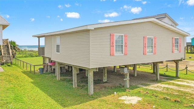4630 Blue Water Hwy, Freeport, TX 77541 - view of home's exterior with a carport, dirt driveway, and a water view
