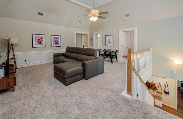 6711 Pebble Beach Dr, Houston, TX 77069 - carpeted living area featuring a ceiling fan and a wainscoted wall
