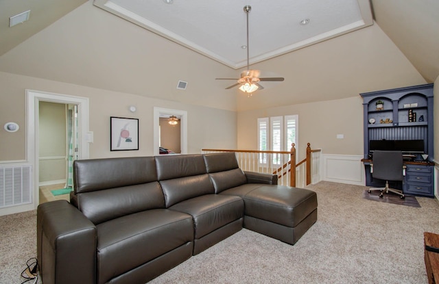 6711 Pebble Beach Dr, Houston, TX 77069 - carpeted living area featuring lofted ceiling, a wainscoted wall, a ceiling fan, a desk, and a decorative wall