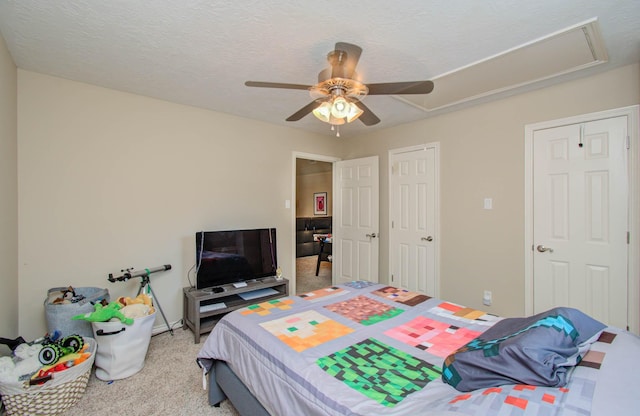 6711 Pebble Beach Dr, Houston, TX 77069 - bedroom featuring light carpet, a ceiling fan, and attic access