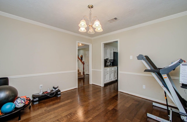 6711 Pebble Beach Dr, Houston, TX 77069 - workout room featuring dark wood-style flooring, a chandelier, and crown molding
