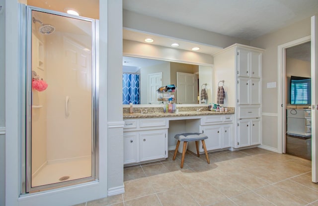 6711 Pebble Beach Dr, Houston, TX 77069 - bathroom featuring a stall shower, vanity, tile patterned flooring, and recessed lighting