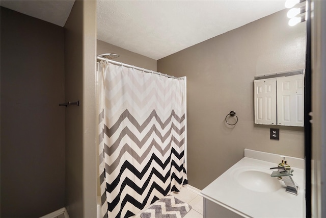 18 S April Mist Cir, The Woodlands, TX 77385 - bathroom with vanity, a shower with curtain, and tile patterned floors