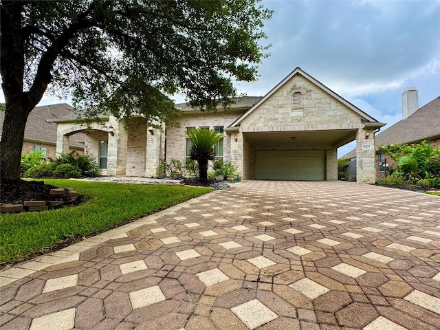 17907 Camp Cove Dr, Cypress, TX 77429 - view of front facade featuring driveway, a garage, a front lawn, and a carport