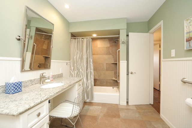 1015 Tri Oaks Ln Unit 23, Houston, TX 77043 - full bathroom featuring wainscoting, shower / bath combo with shower curtain, and vanity