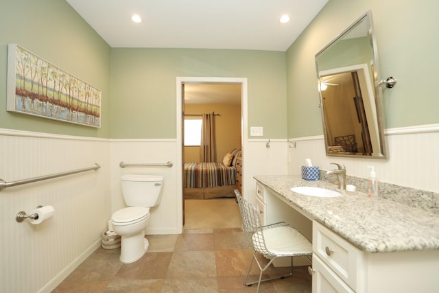 1015 Tri Oaks Ln Unit 23, Houston, TX 77043 - ensuite bathroom featuring vanity and a wainscoted wall