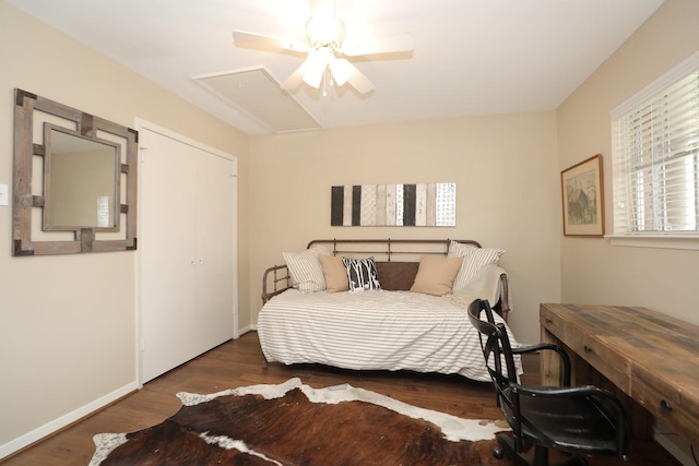 1015 Tri Oaks Ln Unit 23, Houston, TX 77043 - bedroom with wood finished floors, attic access, and ceiling fan