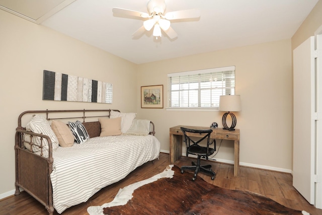 1015 Tri Oaks Ln Unit 23, Houston, TX 77043 - bedroom featuring wood finished floors and a ceiling fan