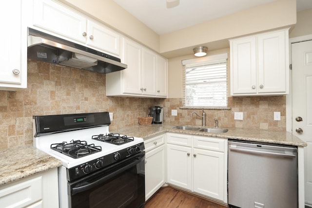 1015 Tri Oaks Ln Unit 23, Houston, TX 77043 - kitchen featuring range with gas stovetop, dishwasher, under cabinet range hood, white cabinets, and backsplash