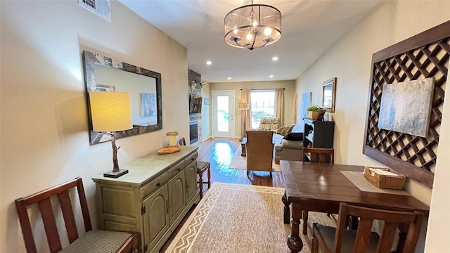 1015 Tri Oaks Ln Unit 23, Houston, TX 77043 - entryway with a chandelier, wood finished floors, and recessed lighting
