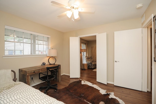 1015 Tri Oaks Ln Unit 23, Houston, TX 77043 - bedroom with wood finished floors and ceiling fan