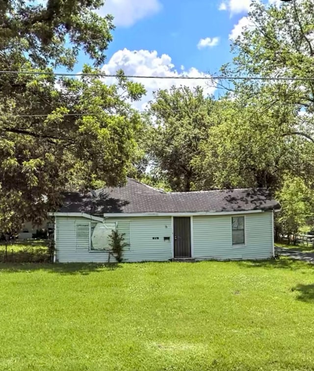 8716 Allwood St, Houston, TX 77016 - back of house with a lawn