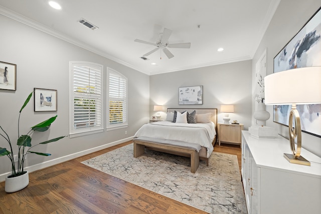 1829 W Main St Unit C, Houston, TX 77098 - bedroom with light wood-type flooring, recessed lighting, ornamental molding, and a ceiling fan