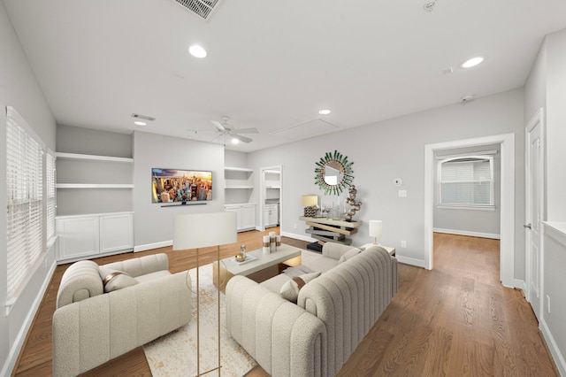 1829 W Main St Unit C, Houston, TX 77098 - living area with attic access, plenty of natural light, wood finished floors, recessed lighting, and ceiling fan