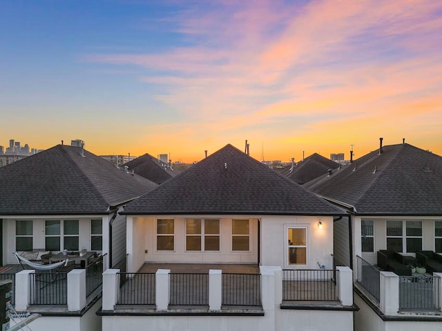 1829 W Main St Unit C, Houston, TX 77098 - back of property featuring a shingled roof and a balcony