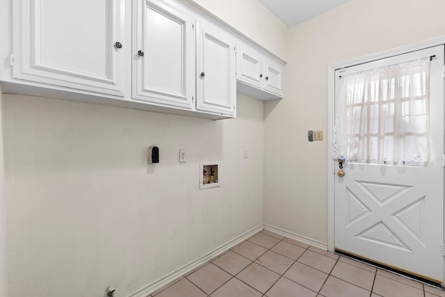 3318 Teawick Ct, Houston, TX 77068 - laundry room with hookup for a washing machine, cabinet space, and light tile patterned floors