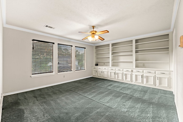 3318 Teawick Ct, Houston, TX 77068 - empty room with ornamental molding, a ceiling fan, dark colored carpet, a textured ceiling, and built in shelves