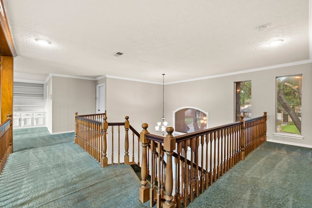3318 Teawick Ct, Houston, TX 77068 - corridor with an upstairs landing, carpet, a textured ceiling, ornamental molding, and a chandelier