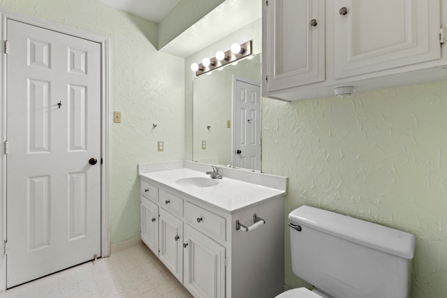 3318 Teawick Ct, Houston, TX 77068 - half bathroom featuring a textured wall, vanity, and tile patterned floors