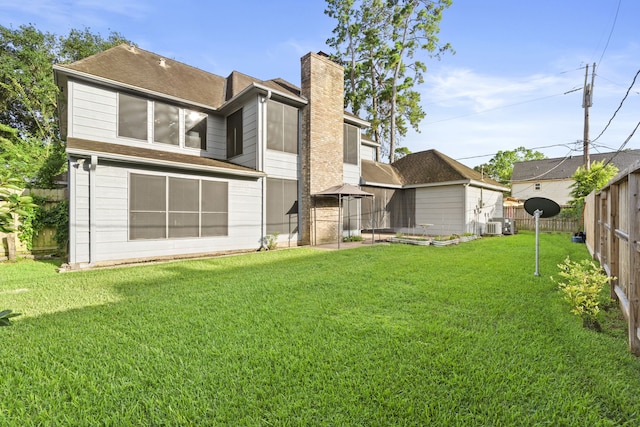 3318 Teawick Ct, Houston, TX 77068 - back of house with a chimney and roof with shingles
