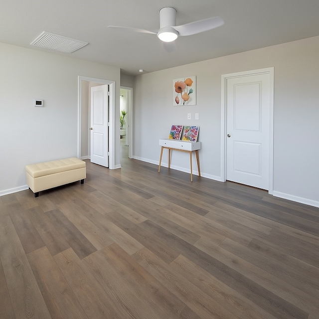 11407 Prairie Walk Dr, Houston, TX 77048 - spare room featuring dark wood-style flooring and ceiling fan